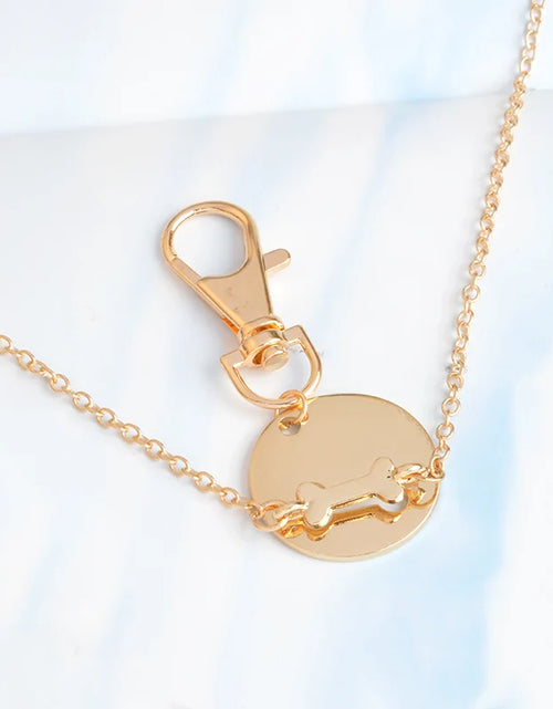 Load image into Gallery viewer, Human Dog Bone Charm Necklace
