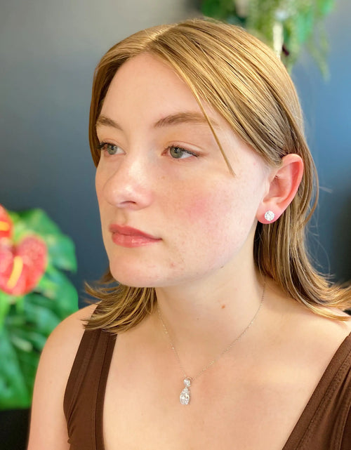 Load image into Gallery viewer, Exceptional Cut Sterling Silver Stud Earrings
